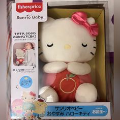 a hello kitty stuffed animal in a box