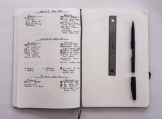 an open notebook with writing on it and a pen sitting next to the page that has been written in