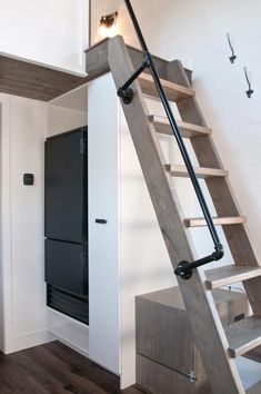 there is a ladder leading up to the loft