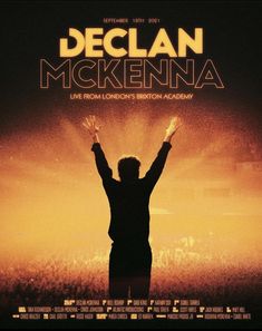 a movie poster with a man raising his arms in the air and hands raised up