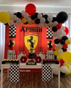 a ferrari themed birthday party with balloons and decorations