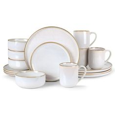 a white and gold dinnerware set