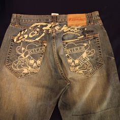 Ed Hardy Jeans 100% Cotton Love Kills Faded Front And Back. Few Ink Spots On Front. Has Rugged Feel And Look. Ed Hardy 2000s, Ed Hardy Clothes, Pants Painting, 2000s Pants, Thrift Manifest, Swaggy Fits, Japanese Street Style, 2025 Moodboard, Bedazzled Jeans