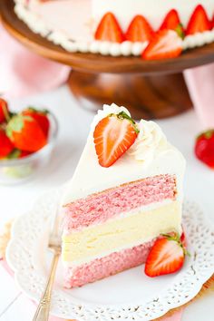 a slice of strawberry cake on a white plate