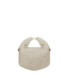 Made from recycled fiber knit, the shearling edition of the Béri model is enhanced with leather trim for a sophisticated downy look. The metal clasp, the bag’s bottom folds, and the sliding-knot shoulder strap combine to form a distinctively strong and elegant design. My Cup Of Tea, Sliding Knot, Leather Trims, Cotton Twill, Elegant Design, Calf Leather, Calf Skin, Fort, Adjustable Straps