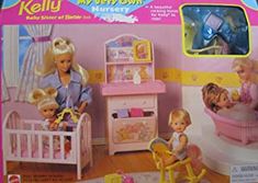 a barbie doll plays in her baby's nursery