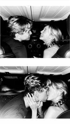 black and white photo of two people kissing in the back seat of a car,