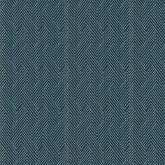 an upholstered blue fabric with herringbones