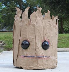 an image of a paper bag that looks like a creature with big eyes and mouth