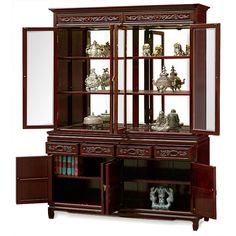 a wooden china cabinet with glass doors and drawers