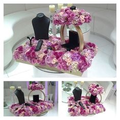 there is a flower arrangement on the table in the shape of a dressmaker's mannequin