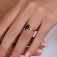 Indulge in the timeless elegance of our 14K gold rings, meticulously crafted to enhance your personal style. Each ring is expertly made from genuine 14K gold, radiating a warm and luxurious glow that will captivate all who lay eyes on it. Our collection boasts an array of stunning designs, ranging from sleek and minimalist to intricate and ornate, ensuring there's a perfect ring to match your unique taste. Whether you're looking for a statement piece to dazzle at special occasions or a delicate band for everyday elegance, we have something to suit every occasion. Crafted with exceptional attention to detail, our 14K gold rings showcase exquisite craftsmanship that stands the test of time. The high-quality gold ensures lasting durability, allowing you to cherish your ring for years to come. 14k Gold Marquise Cut Gemstone Birthstone Ring, Classic Marquise Sapphire Ring In 14k Gold, Elegant Gold Marquise Cut Sapphire Ring, Marquise Blue Ring In 14k Gold, 14k Gold Marquise Sapphire Ring, Gemstone Solitaire Ring, September Birthstone Rings, Blue Gemstone Rings, Marquise Cut