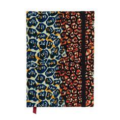 a notebook with an orange, blue and yellow pattern