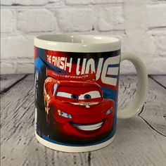 a coffee mug with the character cars on it