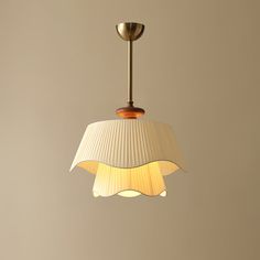 The Bellevue Pendant Lamp brings a touch of French countryside charm to any room. Its double-layer wavy lampshade design, paired with warm off-white fabric, creates a soft and inviting glow. Elegant and romantic, this lamp is perfect for adding a cozy atmosphere to any space. If you have any questions about our products, please get in touch with us and we will reply to you within 24 hours. Product Size Size: Dia 25cm x H 34cm / ∅ 9.8″ x H 13.4″ Size: Dia 50cm x H 35cm / ∅ 19.7″ x H 13.8″ Size: D Wavy Lampshade, Hallway Wall Lights, Tiffany Style Table Lamps, Chandelier Art, Kitchen Island Chandelier, Lampshade Designs, Flushmount Ceiling Lights, Ceiling Lamp Shades, Farmhouse Chandelier