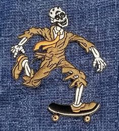 a skeleton skateboarding on a blue cloth