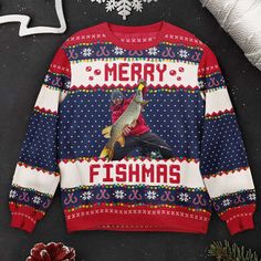 a ugly christmas sweater with a fish on it