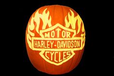 a pumpkin carved to look like harley davidson cycles