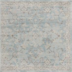 a blue and beige rug with an ornate design