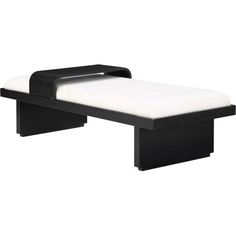 a black and white bed frame with a mattress on it's end, against a white background