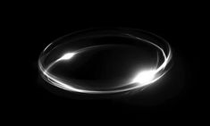 an object is shown in the dark with light coming from its center and around it