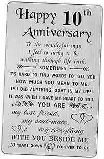 a metal plaque with the words happy 10th anniversary