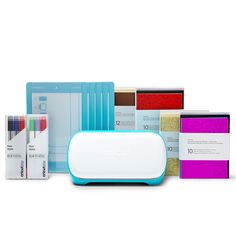 an assortment of different colors and sizes of paper on a white surface with the package in front of it