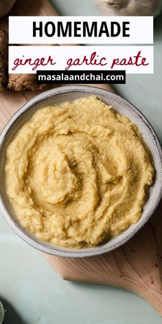 homemade ginger garlic paste in a bowl on a cutting board