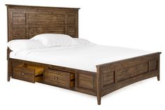 a wooden bed frame with two drawers on each side and a white pillow in the middle