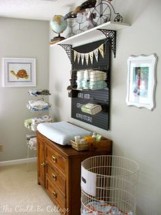 a baby's room with lots of items on the shelves