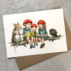 three children are sitting on a tree branch with a mouse in front of them and one is holding a book