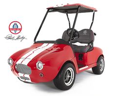 a red and white golf cart on a white background