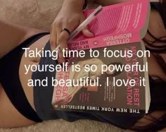 a woman laying on top of a bed next to a book with the quote taking time to focus on yourself is so powerful and beautiful i love it