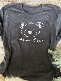 ✧ ITEM DESCRIPTION ✧ This set includes One *Grey* Mama Bear T-Shirt (select size) -With an option for- One *Cream* Little Bear Bodysuit- OR White T- Shirt ✧Size ✧ Adult Shirt sizing is Unisex Sizing S *CHEST* 18 in *LENGTH* 28 in M *CHEST* 20 in *LENGTH* 29 in L *CHEST* 22 in *LENGTH* 30 in Wash * Cold water inside out *All my items are handmade so each piece is unique for you! *Made in my smoke free home I hope you enjoy my products as much as I do! But please note that the product designs in t Cotton Tops With Bear Print And Relaxed Fit, Cute Cotton T-shirt With Bear Design, Cute Gray Top With Graphic Print, Casual Bear Design Short Sleeve T-shirt, Casual Bear Design Crew Neck Top, Cotton Graphic Tee With Bear Design, Short Sleeve Graphic Tee With Bear Design, Cute Gray Crew Neck Top, Casual Cotton T-shirt With Bear Design