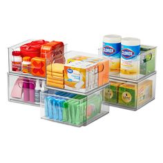 three clear plastic containers with different items in them