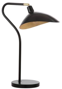 a black and gold desk lamp on a white background, with the light turned off