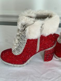 Winter Embellished Ankle Boots, Embellished Ankle Boots For Winter, Glamorous Winter Boots With Rhinestones, Glamorous Rhinestone Winter Boots, Glamorous Winter Boots With Rhinestone Fringe, Glamorous Winter Boots With Bling, Glamorous Rhinestone Heeled Boots For Winter, Glamorous Winter Platform Boots, Winter Rhinestone Boots With Round Toe