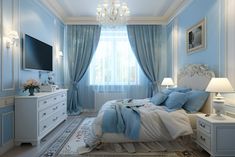 a bedroom decorated in blue and white with a chandelier hanging from the ceiling