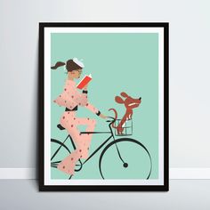 A woman reading a book while riding a bike with a dog in a basket.The woman is wearing a pink jacket and trouser with strawberries pattern. The brown dog is holding a pencil in his mouth. light blue background. Last minute gift for a book lover.Bookworm Poster.Artwork for Book Lovers Riding A Bike, Woman Reading, Poster Artwork, Reading A Book, Market Place, Art Handmade, Animal Wall Art, Home Items, Bike Ride