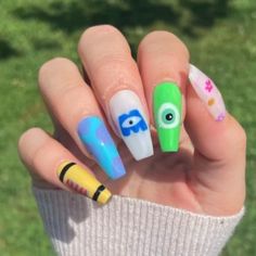 Disney Movie Nail Art, Disney Cars Theme Nails, Pixar Nails Simple, Monsters Inc Nails Design, Elemental Nails Disney, Monsters Inc Nails Acrylic, Monster Ink Nails, Monster Inc Nails Design