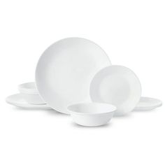 white dinnerware set on a white background