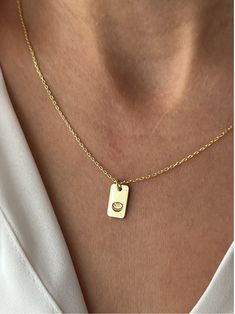 Cozy latte necklace for a warm, caffeine-inspired charm  Welcome to Le Petite Jewelry  💎 🌟   🎀 🪄 🧡  Find your destination for exquisite 925K Sterling Silver jewelry with a touch of elegance and charm. Our collection features adorable, petite designs crafted with the utmost care and attention to detail. ✨  Highlights ✨  🌟 14K Gold, Rose Gold and Silver color options 🔗 16 inches / 40 cm, 18 inches / 45 cm and 20 inches / 50 cm chain length options Plus a 2-inch / 5 cm extender for the perfect fit 📏 Measurements of the charm are: 0.5 inch - 0.3 inch / 1.2 cm - 0.7 cm 🪄 Each piece is uniquely crafted, so you may notice tiny variations that make every item special.  ✨ They are all handcrafted and polished to the best of our ability, so slight imperfections like minor scratches or lines Dainty Brass Charm Necklace Tarnish Resistant, Minimalist Brass Pendant Charm Necklace, Everyday Brass Charm Necklaces, Tarnish Resistant, Minimalist Gold-tone Brass Necklace, Coffee Bean Necklace Gold, Petite Jewelry, Art Necklaces, Latte Art, Coffee Lover Gifts