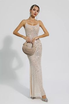 Experience timeless beauty with our Indie Apricot Embellished Mesh Maxi Dress. Showcases a delicate mesh overlay adorned with exquisite embellishments. Its graceful silhouette effortlessly flatters your figure. Perfect for special occasions or a night out.  Dress Length: Approx 132cm Materials: Polyester Gentle Dry Clean Only  Model is 5 ft 7 and wears size S  Colour may vary due to lighting on images. The product images (without model) are closest to the true colour of the product.  Item runs t Silver Sequin Top, Glitter Wedding Dress, Indie Dresses, Ibiza Outfits, Bandage Midi Dress, Mesh Maxi Dress, Floral Shirt Dress, Puff Sleeve Dresses, Mesh Overlay