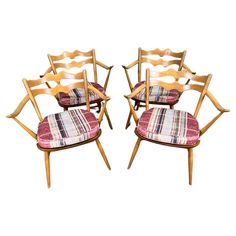 set of six chairs with upholstered cushions