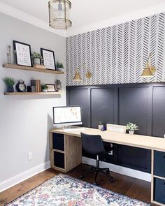 a home office with two desks and shelves on the wall above it, along with an area rug