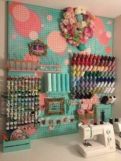 the sewing room is organized with lots of crafting supplies