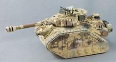 a toy tank with camouflage paint on it