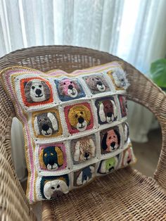 a crocheted dog pillow on a wicker chair in front of a window