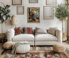 a living room filled with lots of furniture and pictures on the wall above it's couch