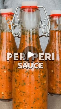 three bottles of pepper sauce sitting on top of a counter with the words perpeti sauce in front of them